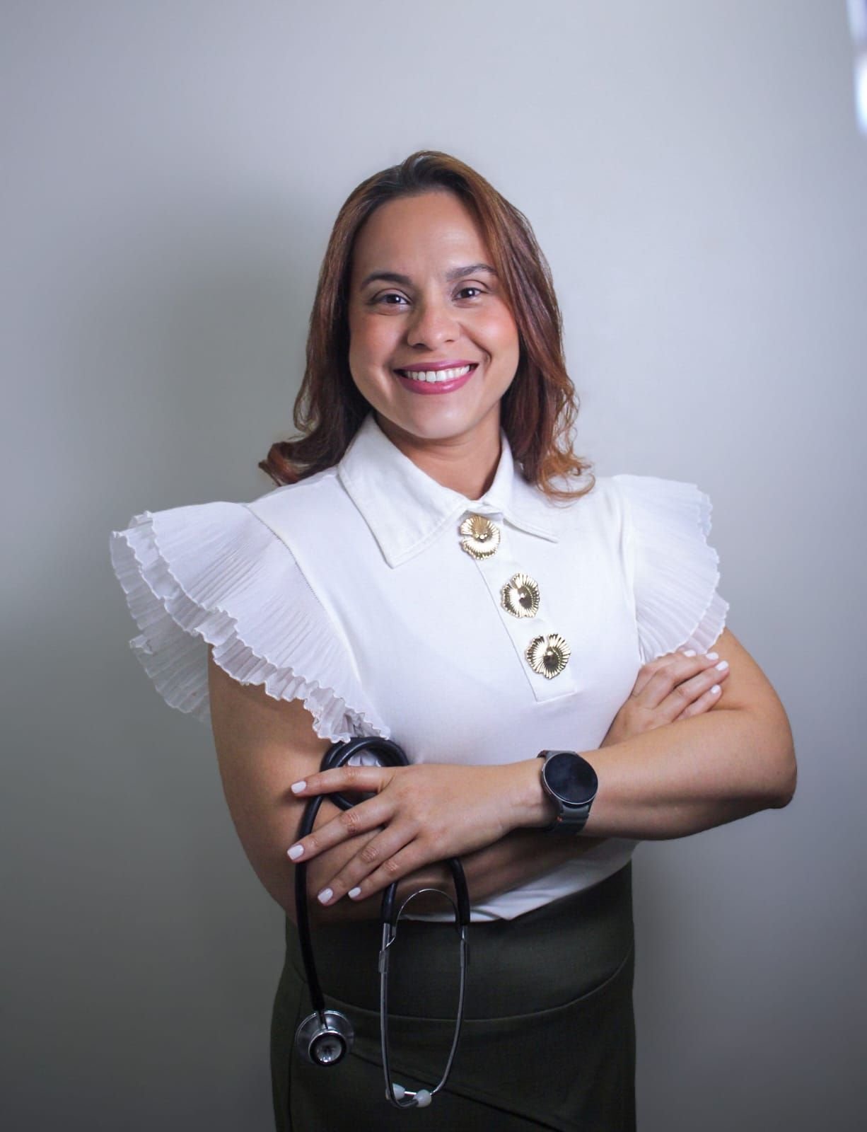 Portrait of Dr. Nicolle Martínez with a stethoscope
